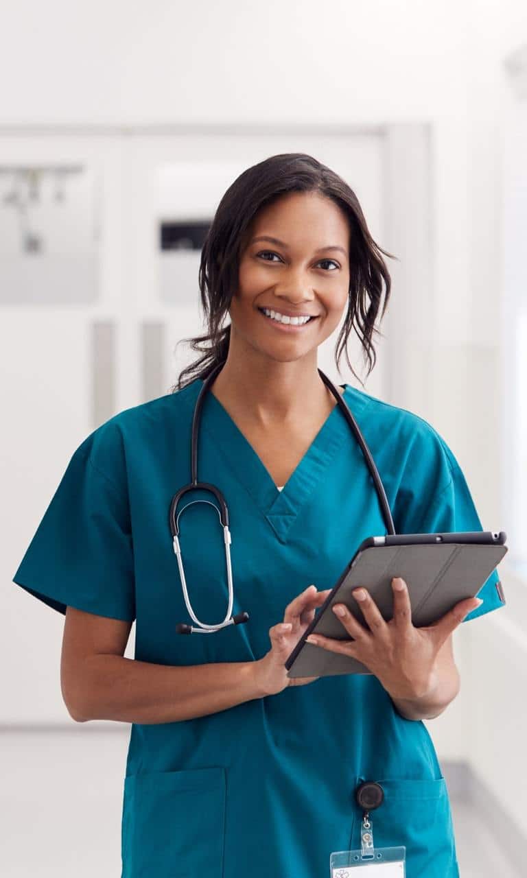 Female Healthcare Professional Holding A Tablet For Medical Staffing